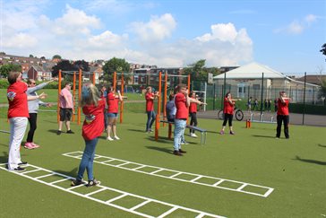 Members of BYA warming up before their fitness session